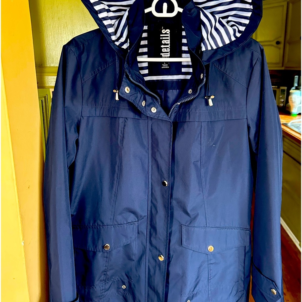 Woman’s NWOT windbreaker with removable hood